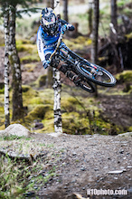 Giants Danny Hart avoiding the rain during unofficial practice at Round 2 of the Saracen British Downhill Series 2013 from Fort William