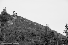 Sarah Leishman and Joe Schwartz drop from the peak of Mt Thurston