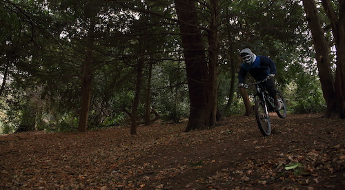 Self portrait of me riding through the woods at the top of darley abbey park.