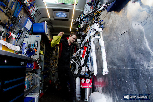 A bike rack near the front of the Sprinter van often houses bikes that require work so that the mechanics always have something to work on between house calls.