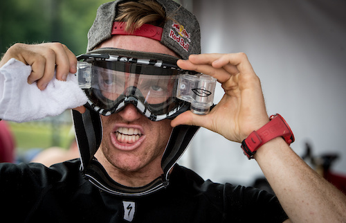 Aaron Gwin making sure he has a clean line of sight through the mud.