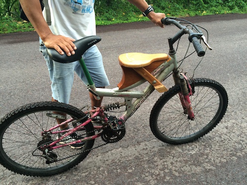 bike with wooden child carrier