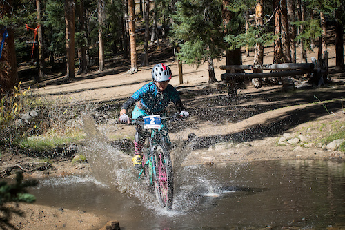 After getting to a semi normal elevation there became many creek crossings. This one in-particular was very refreshing and welcome during such a long stage. Possibly the longest Enduro stage in the world, currently. Pro woman 3rd place winner gets wet.