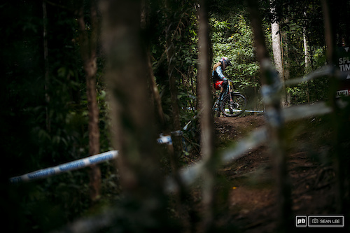 Rachel Atherton pauses to scope out the track early in the day.