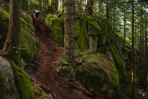 Jordan drops in to a loamy chute on his Chromag Stylus.