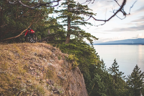 Josh on a sketchy cliff top corner on Hornby Island