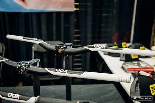 Box Components .one. Carbon DH bar. The bar comes in 15 or 30mm rise. The 15mm features a 7º backsweep and 5º up, while the 30mm is 9º back, 5º up. Each are set around a 35mm clamp and are 800mm wide.
