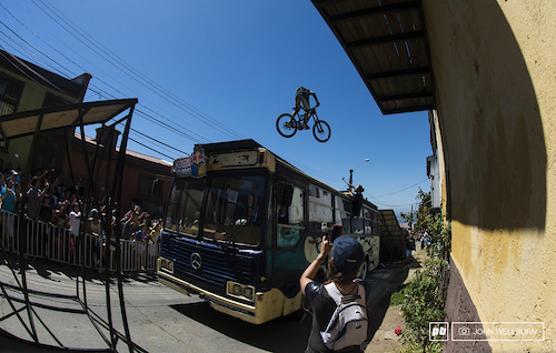 Argentina's Mauricio Flores jumps over the massive bus gap with style in warm ups.