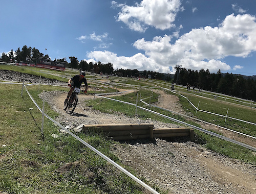 Szymon racing the 2018 Masters World Championships in Vallnord.