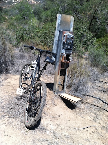 Old pay phone on trail.
