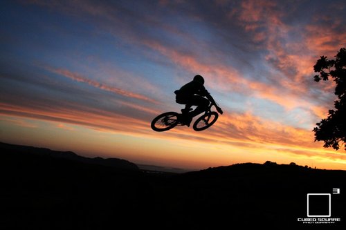 Duane throwing in a table in the sun set - Cubed Square Photography - Laurence CE