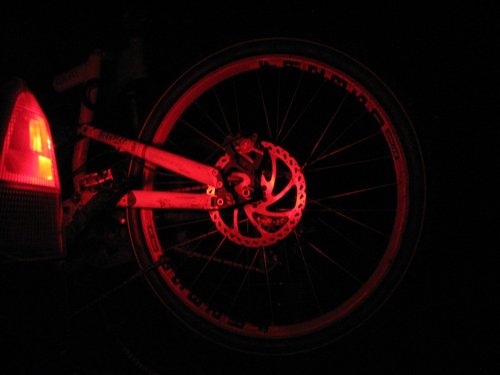 I was staring this red wheel all night during the drive. I thought it looked cool so i took a pic...ahh the things that you find cool when you bored out of your mind!