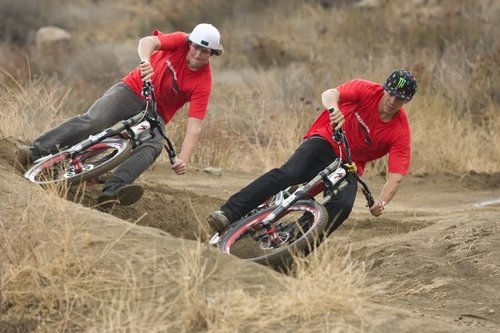 sam hill and brendan taking a berm on their new specialized!
