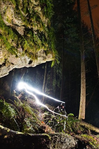 Cam Burnes ripping some dark pacific northwest singletrack on his TransAm