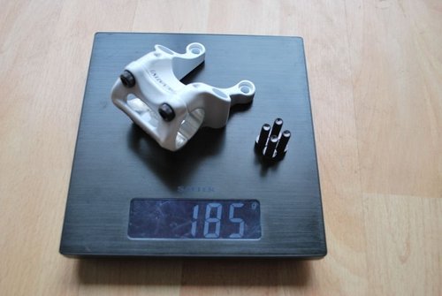 185 Grams in the flesh, should be no surprise how many companies weigh their stems without the fixing bolts and sometimes without the four front bolts!