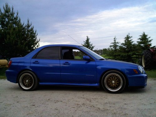 2002 impreza. cnc suspension, tgv deletes, cbm front rad, wiseco pistons and valve springs, eagle cams, brian cower ti retainer set, sbr turbo, garret barrings, hks blow off valve, engine is bored and tuned to 400+ hp to the wheels, its a rocket.