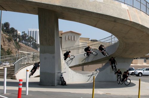 This is most likely the most insane curved wall ride on the planet. The area where you drop off of this thing hovers around 15 to 17 feet. To flat concrete. Seconds after this photo was taken, the landing broke a brand new set of crank arms. This is just bad ass!