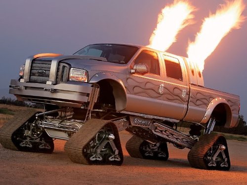 Sick F-350 fitted with tracks and flamethrowers