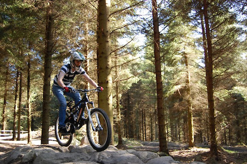 practicing my tech on a rock section at llandegla on a friends Orange.