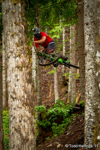 Boosting a hip in the Whistler valley during shooting for Dan Barham's Deep Summer photo show
