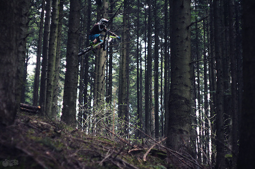 flying high in woods
photo by www.sheiffa.blogspot.com 
Follow me:
http://www.facebook.com/Jaws.Freerider