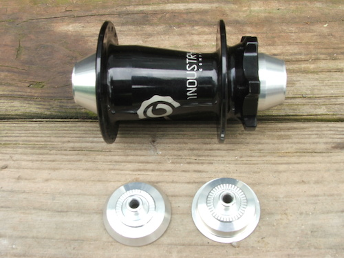 Industry Nine 20mm threw axle front hub. Comes with quick release adapters. NEVER BEEN USED.