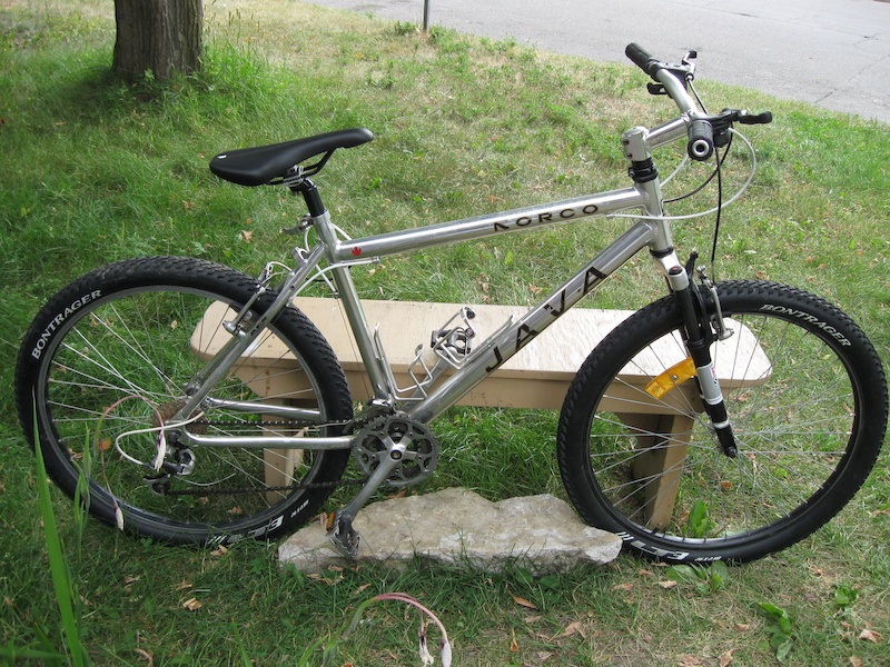 ladies hybrid bike with front suspension