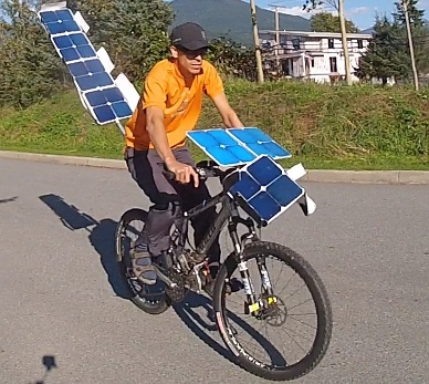Cruising at 7 km/h on solar energy alone... trying to break 10km/h next year!
8 solar panels - each weighing just 100g each.. plus lightweight mounting hardware..