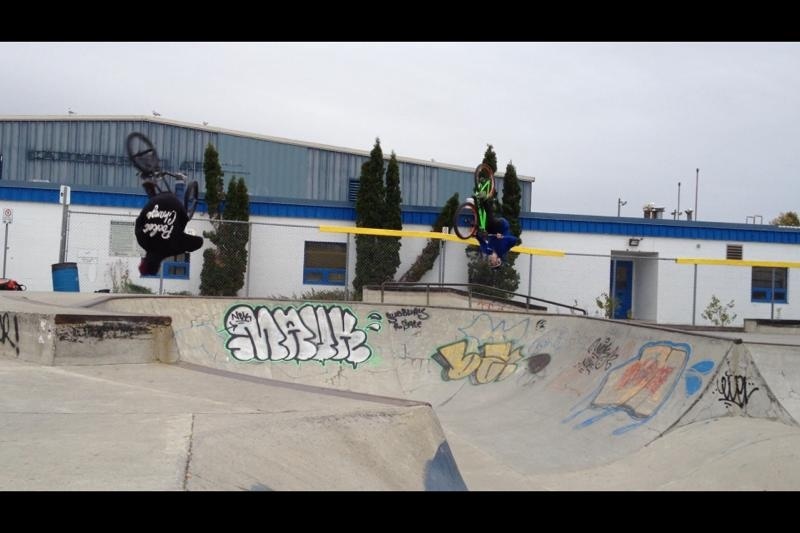 Bmx and mtb having a good time together . Ryan with the flair and Matt with the flip