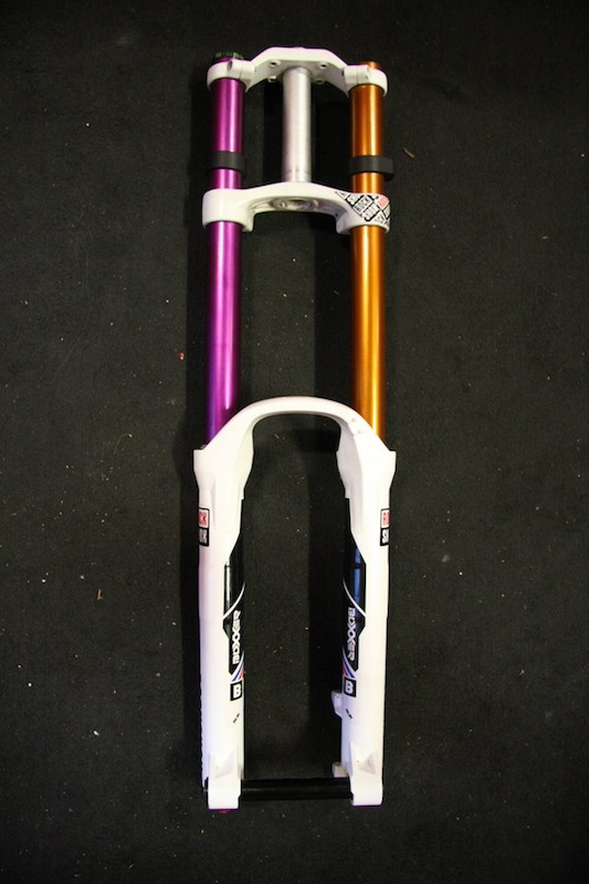 Purple and Copper RockShox Boxxer Stanchions WECB MKII coating.