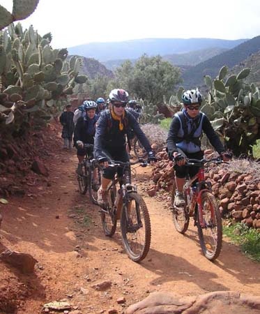 Biking through the Berber villages &amp; track in the Atlas Mountains