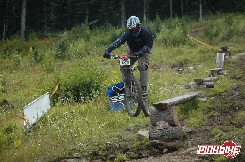 last log ride befor eyou cross the finish line/bridge during the McBike Backdoor Downhill. Hosted by the Bulkley Freeriders Society, and sponsored by McBike & Sport, Ski & Ride Smithers, and Valhalla Pure