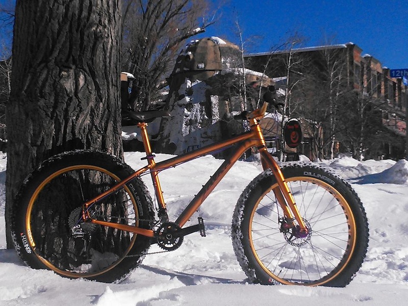 Gold Salsa Mukluk at Orange Peel Bicycle Service in Steamboat Springs,CO.
Gold Surly Rolling Daryl rims laced to Salsa Conversion 2 hubs. Sram XO grip shift/drive train. Surly OD crank and 45NRTH Dilinger Tires.