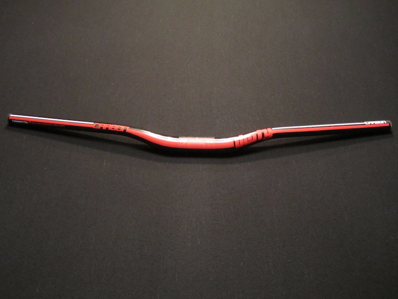 Deity DC31 Mohawk carbon bars in red for sale. Less than 10 rides with NO crashes!