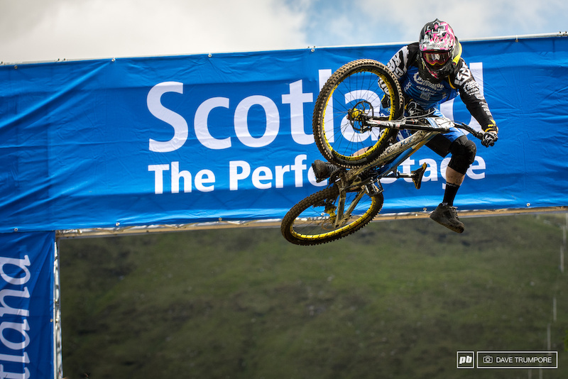 Joe Smith is one of the few flat pedal holdouts here at Fort William and he is attacking with foot out flat out style on track and in the air.