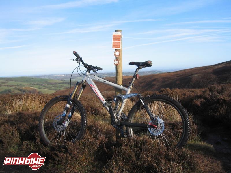 Cove G Spot parked at the marker post for the start of Llwybr y Garth on the Llwybr Archdale MTB trail near Moel Famau