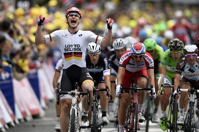 André Greipel (Lotto Belisol)
tops Alexander Kristoff in the sprint and wins his first stage of the 2014 Tour de France... 

Photo credit © Bettini Photo