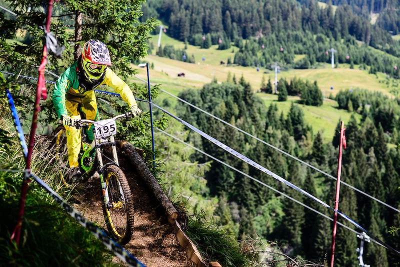 The winner of the iXS Rookies Cup, the 12year old Anton Metsaerinta of Finnland races down the downhill track of the Bikepark Serfaus-Fiss-Ladis during the Kona MTB Festival Serfaus-Fiss-Ladis.ROOKIES in Tyrol, Austria, on August 9, 2014.Free image for editorial usage only: Photo by Felix Schüller.
