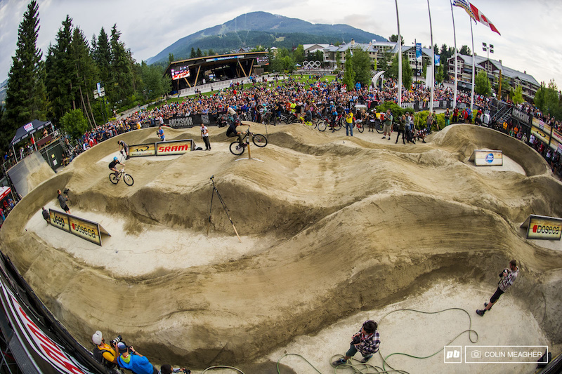 Head to head pump track action in Whistler Village during the the Crankworx 2014 Pumptrack Challenge competition. Just like dual slalom, riders got one run on each track, with the time differential determining who advances to the next round.