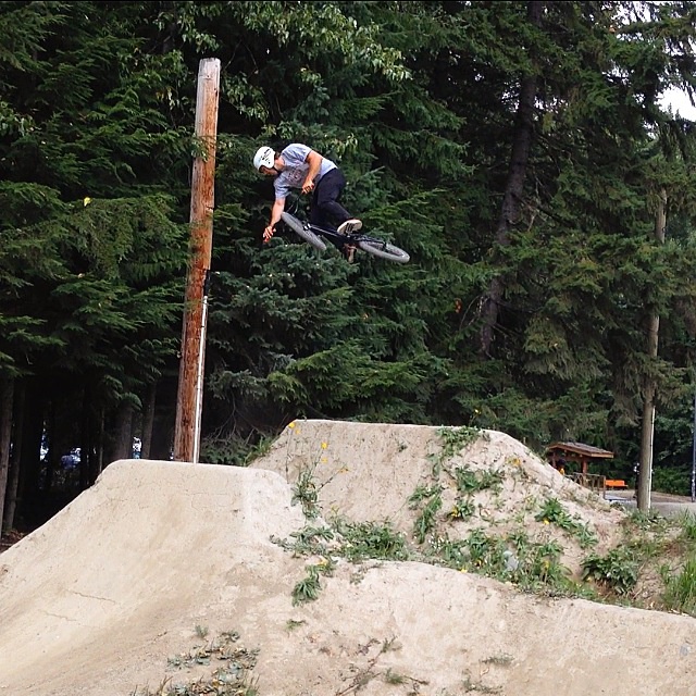 360 over the last jump in the main line at the river side jumps in whistler