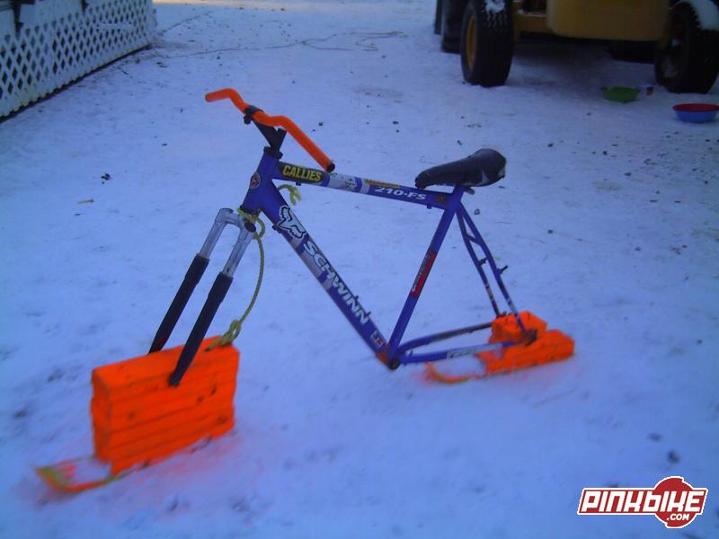 my snow bike, same pic as last time exept i painted the handle bars. i still need to get pegs weilded