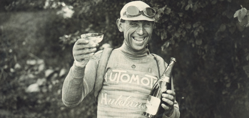Lucien Buysse, 1926 Tour de France. Celebrating overall victory in Paris.
  IMAGES FROM CYCLING’S GLORY DAYS, GOGGLES &amp; DUST.  Goggles &amp; Dust is authored by Shelly and Brett Horton.  Photo Credit @ HortonCollection.com