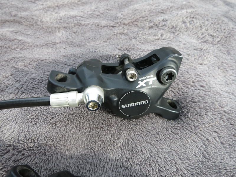 2014 Shimano XT brakes (Front and rear)
