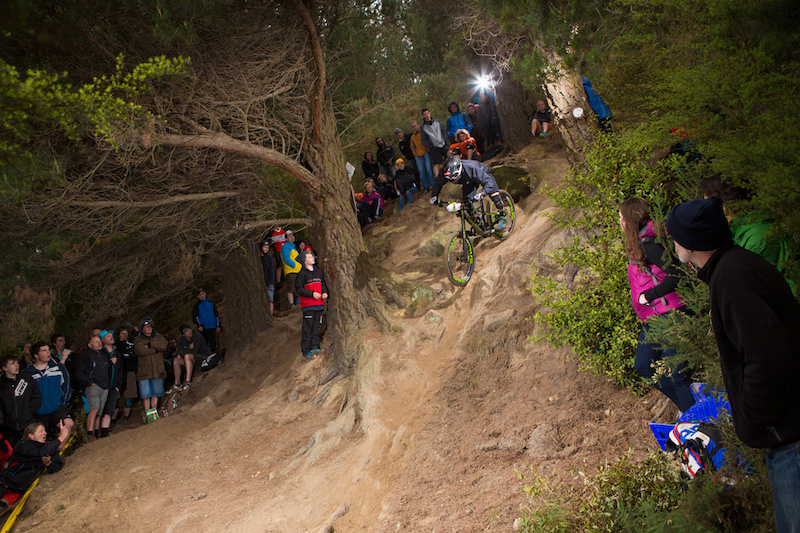 Cannondale Factory Racing rider and Commonwealth Games Gold Medalist Anton Cooper, of Christchurch, drops into Timmy's track at the Urge 3 Peaks Enduro mountain bike race held in Dunedin, New Zealand, December 6-7, 2014.