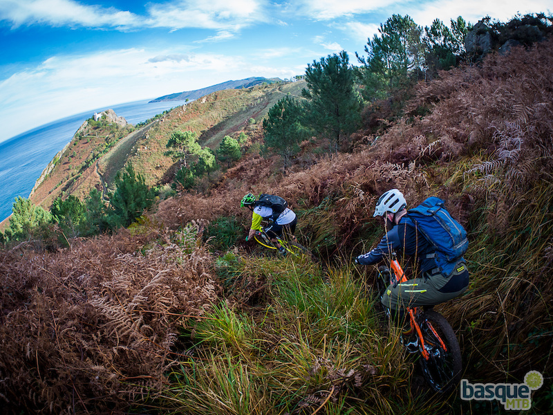 There are a few guys clearing the old trails on this coastal mountain this is one of them. It must have been an old trail at one point with switchbacks leading up to the buildings at the top. Now it s a lovely flowy descent to the bottom lighthouse.