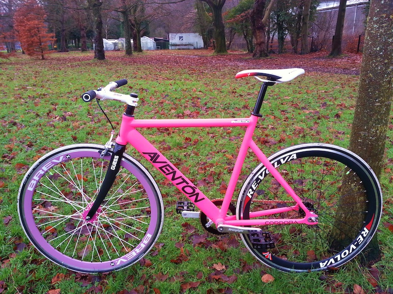 Aventon Cordoba, with the optional front wheel...BREV M 36spokes, lilac rim, pink hub, white spokes, black nipples. Took it back off as I'm not sure it matches? But super stiff over the rear Re-volva.