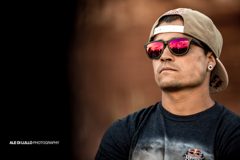 The reflection of Rampage podium in andreu's sunglasses.
