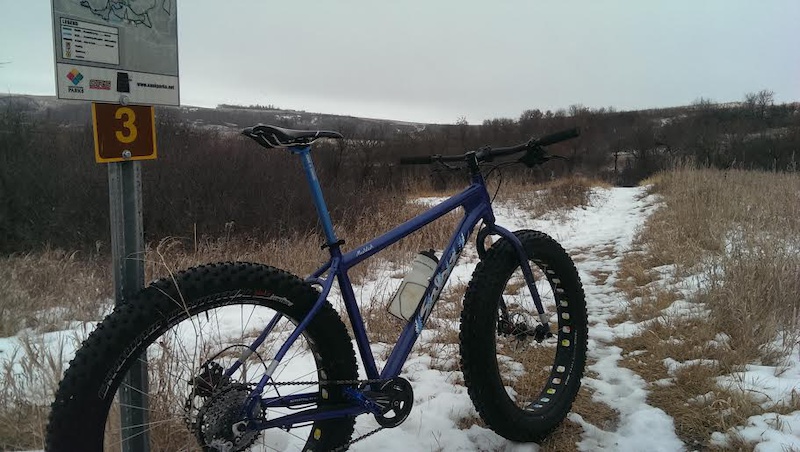 The first fatbike I borrowed in Regina out at Wascana trails after a melt refreeze. I was thoroughly impressed by the amount of fun I had in a variety of conditions so long as I didn t need to get through anything too deep and heavy. Photo and bike Jeremy Erdmann.