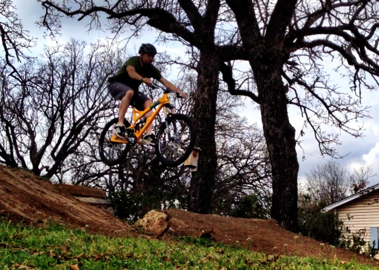 When it rains in the Dallas/Fort Worth area all trails get shut down due to the high clay content in the soil.
Thankfully I have a few jumps at my house to play on when the trails are shut-down.
I still need to build the landing up some more as it tends to be a little flat if I overshoot it. As long as I keep it 10-13' it's all good.