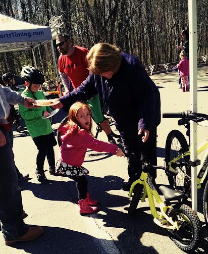 well, the #COMMENCAL brand was totally new to everyone who swung by our tent. They have bikes for everybody &amp; were totally awesome in reaching out and helping my dad and his program, Bikin' Dads Adventures. This girl would not let go of the little 12" Ramones model by #COMMENCAL
